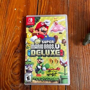 Nintendo New Super Mario Bros. U Deluxe - Yellow/Multicolor Game Case